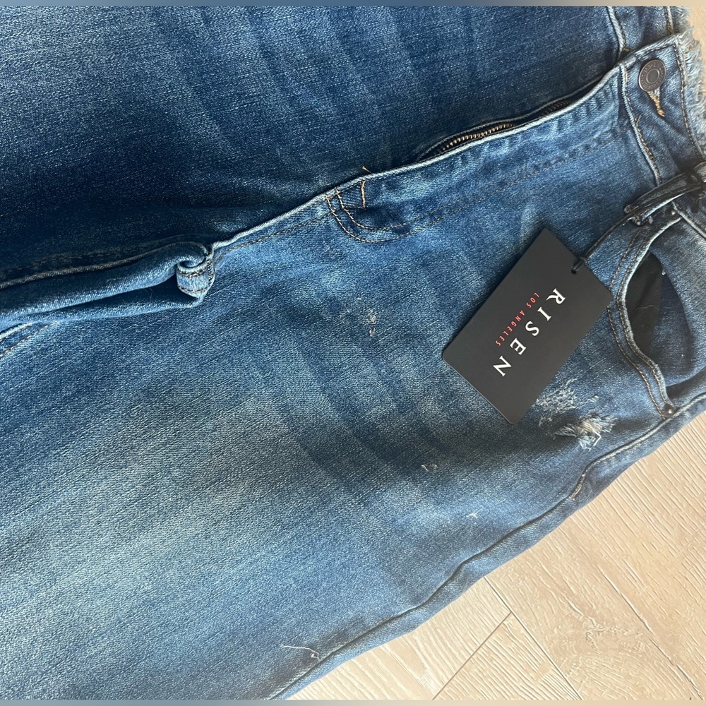 Never worn Risen jeans.